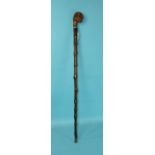 A walking stick, probably blackthorn, with carved figure of a man with hooked nose, carved in top 'S