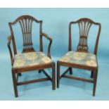 A set of eight mahogany Hepplewhite-style dining chairs, each with pierced splat and drop-in seat,