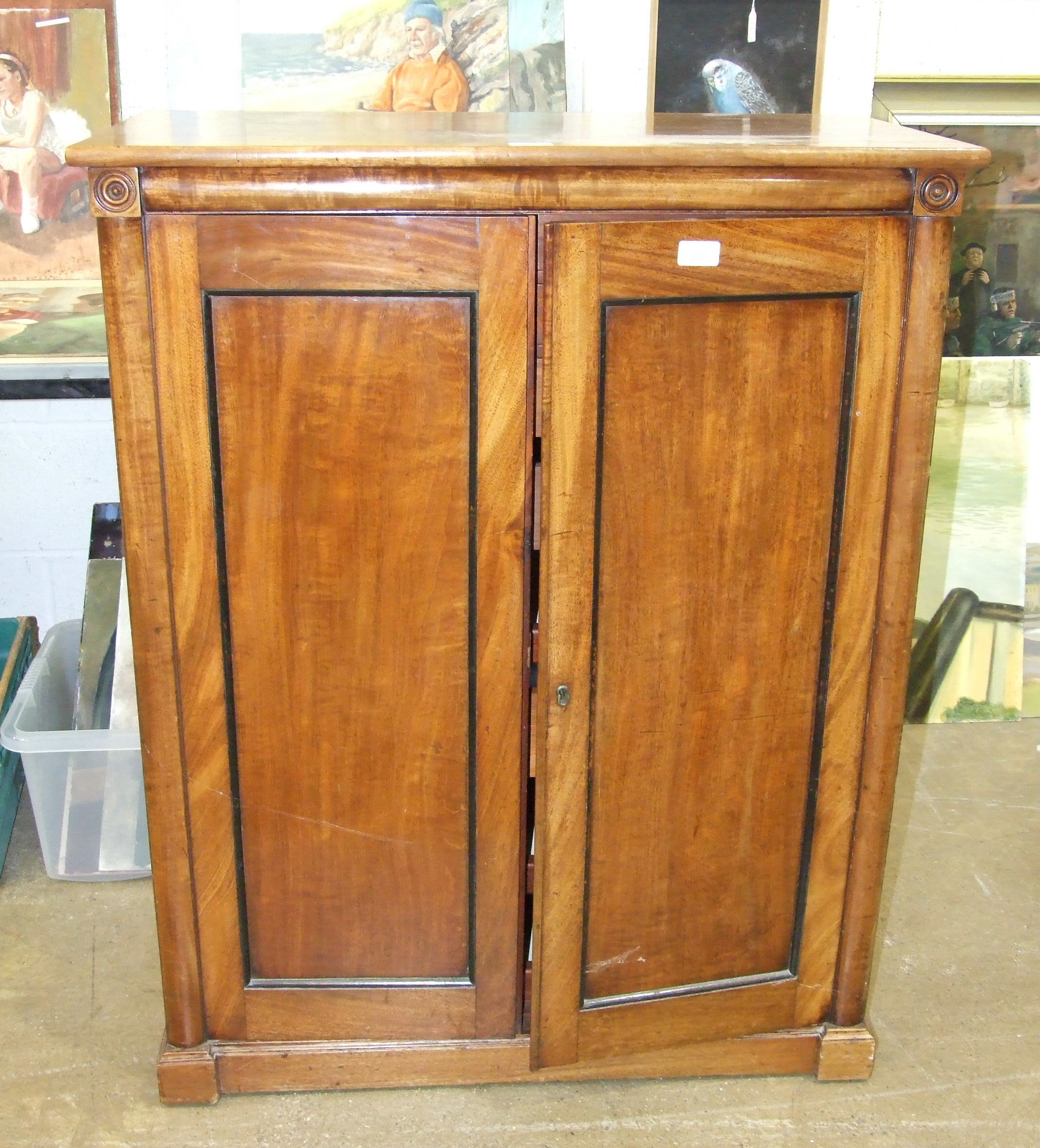 An early-19th century mahogany side cabinet of rectangular shape having a pair of panelled doors - Image 2 of 3