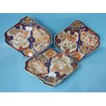 A set of four Japanese Imari shaped fan dishes, 29cm.