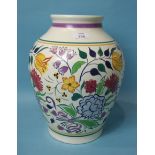 A large Poole Pottery vase of ovoid form with polychrome painted decoration of stylised flowers