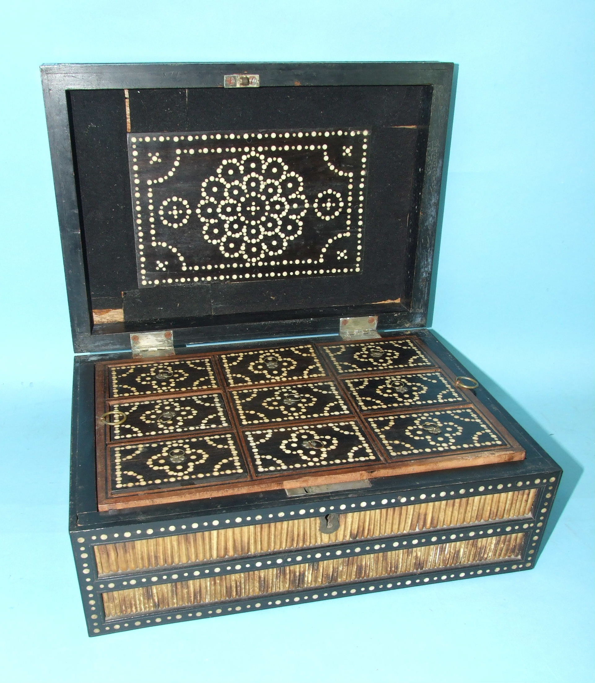 A Victorian porcupine quill jewellery box with ebony-framed and ivory inlay decoration, the hinged