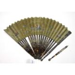 An 18th century tortoiseshell fan, the guards and sticks pierced, carved and with gold and silver