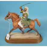 A Beswick figure of a Bedouin Arab Warrior on horseback, impressed 2275 to base, 27cm high, raised
