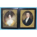 A pair of 19th century miniature portraits of a gentleman wearing a blue coat and white stock and