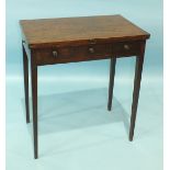 A Georgian mahogany folding tea table, the top with two folding leaves above a pair of end
