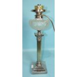 A silver-plated Corinthian column oil lamp with cut glass reservoir, 54cm high with later electric