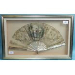 A 19th century fan with mother-of-pearl guards and sticks and signed painted gauze leaf.