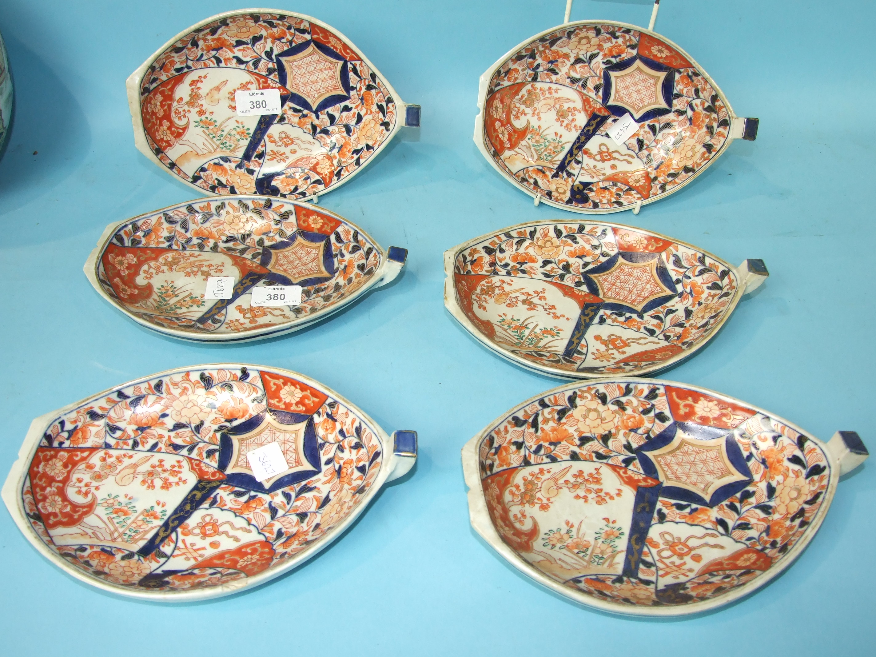 A set of six Japanese Imari boat-shaped dishes, 24cm long.