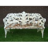 A cast iron fern pattern garden bench, 151cm wide, (old repairs to back).