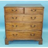 A George III mahogany rectangular chest of two short and three long moulded-edge oak-lined