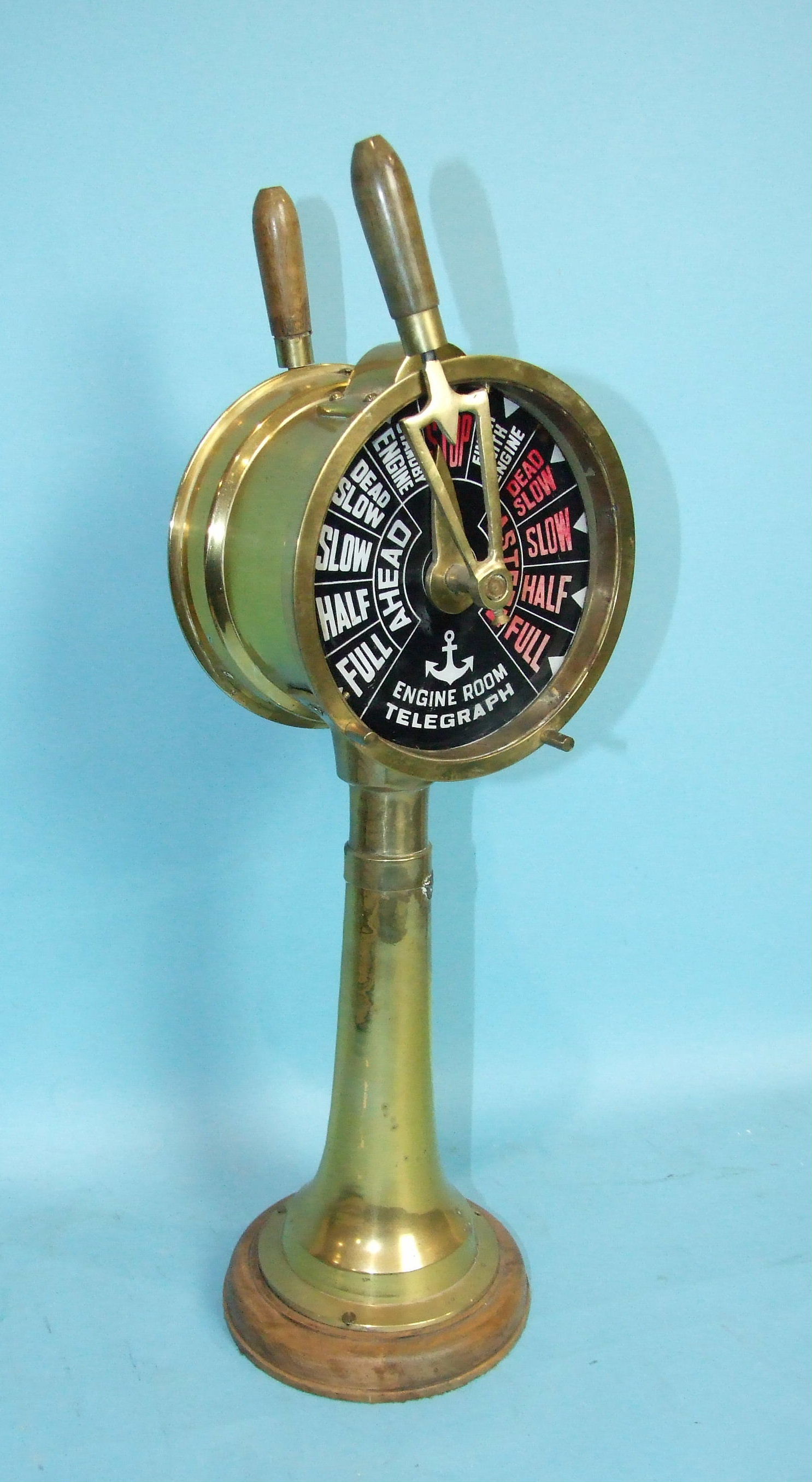 A brass ship's engine room telegraph, 55cm high.