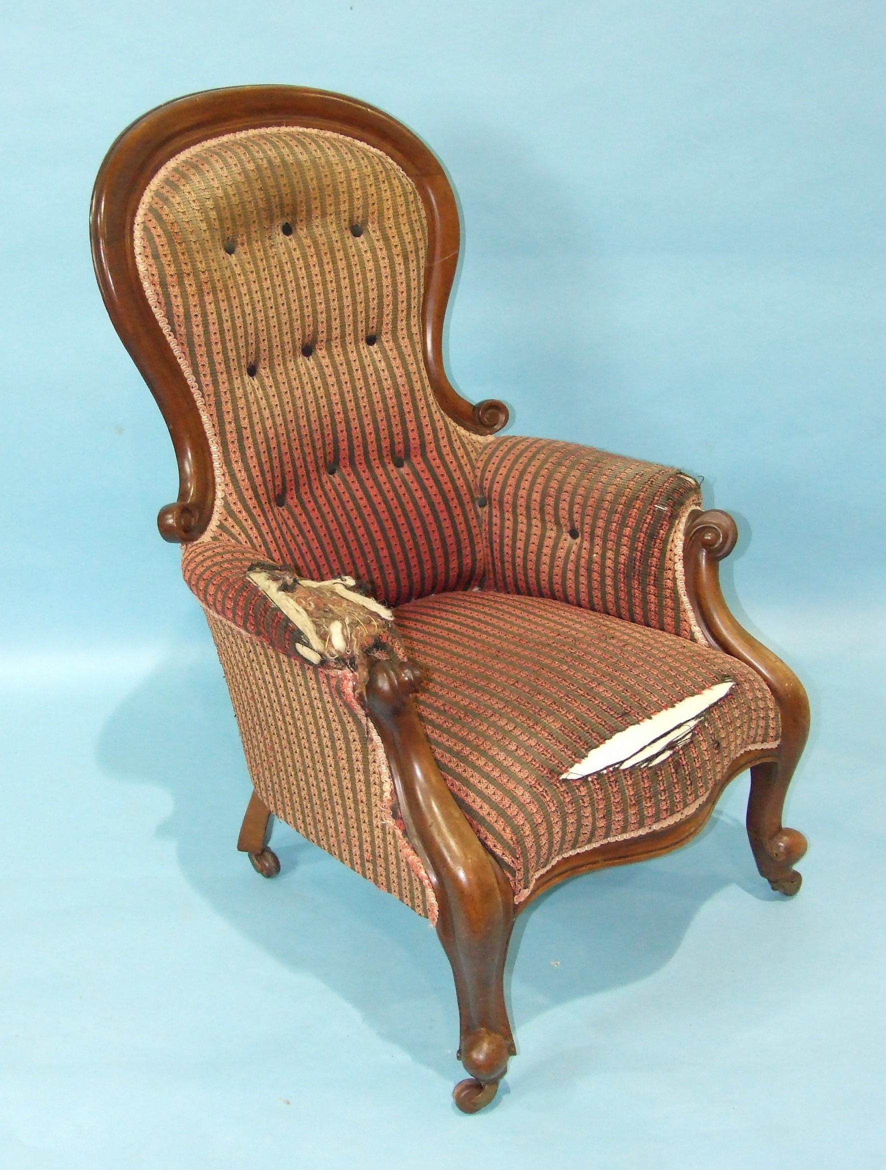A Victorian mahogany button-back salon chair with moulded, framed and upholstered serpentine seat,