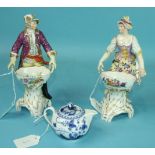 A pair of Berlin porcelain figures of a lady and her companion, (a/f) and a small Meissen blue and