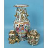 A 19th century Japanese Satsuma jar and pierced cover painted with panels of figures in