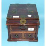A 19th century Oriental lacquered wood jewellery box, the hinged top concealing a folding mirror