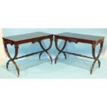 A pair of Continental reproduction mahogany centre tables, each rectangular top inset writing