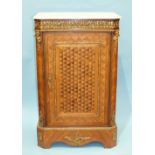 A 19th century French parquetry pier cabinet with white marble top and overall parquetry inlay
