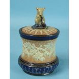 A Doulton Burslem stoneware tobacco jar and cover of waisted form, decorated overall in blue and