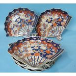 A set of eight Japanese Imari shaped fan dishes, 28cm, (1 a/f).