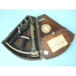 Ripley & Son, Hermitage, London, an ebony octant with ivory scales and brass fittings, shades and