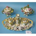 Two mid-19th century Coalport pot pourri vases and covers painted and encrusted with flowers, on