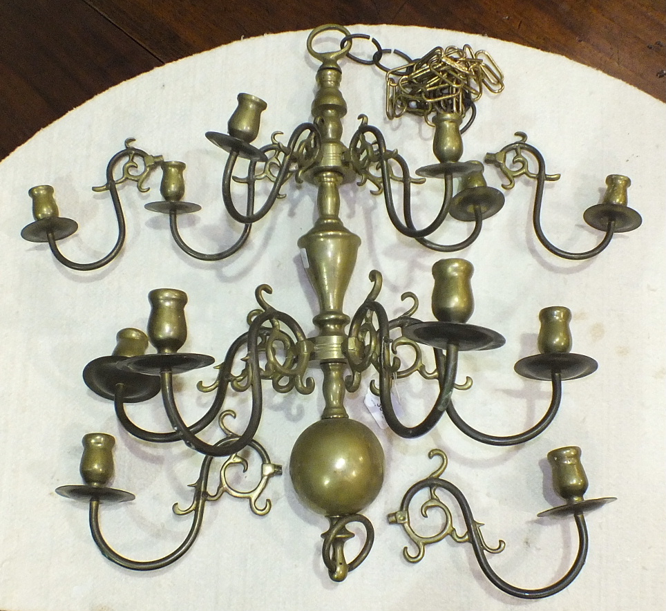 A brass two-tier 12-branch chandelier, 67cm high, 55cm diameter.