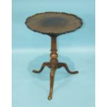 A George III tilt-top occasional table, the top with Chippendale border and bird-cage action, on