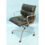 An Eames-style soft pad revolving office chair, (in poor condition).