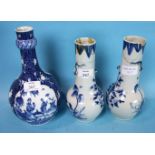 An 18th century Chinese blue and white bottle vase, a pair of vases with applied dragon handles