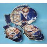 A large 19th century Japanese Imari porcelain fish-shaped dish and five similar smaller dishes,