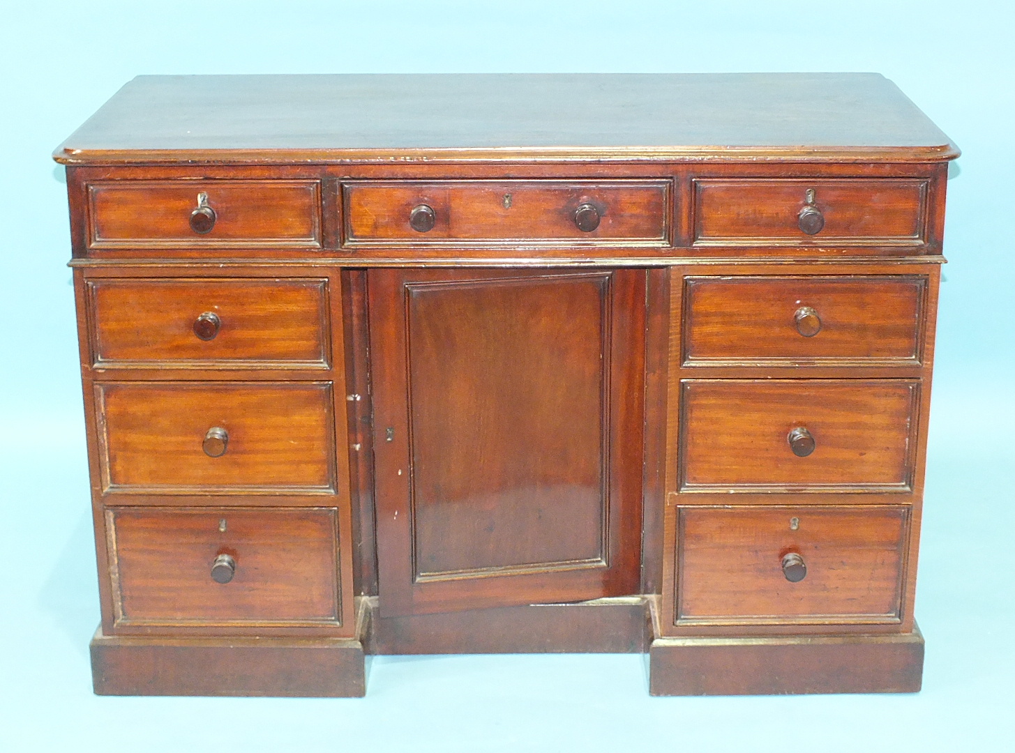 A Late-Victorian mahogany knee-hole dressing table having an arrangement of three frieze drawers and - Image 2 of 2