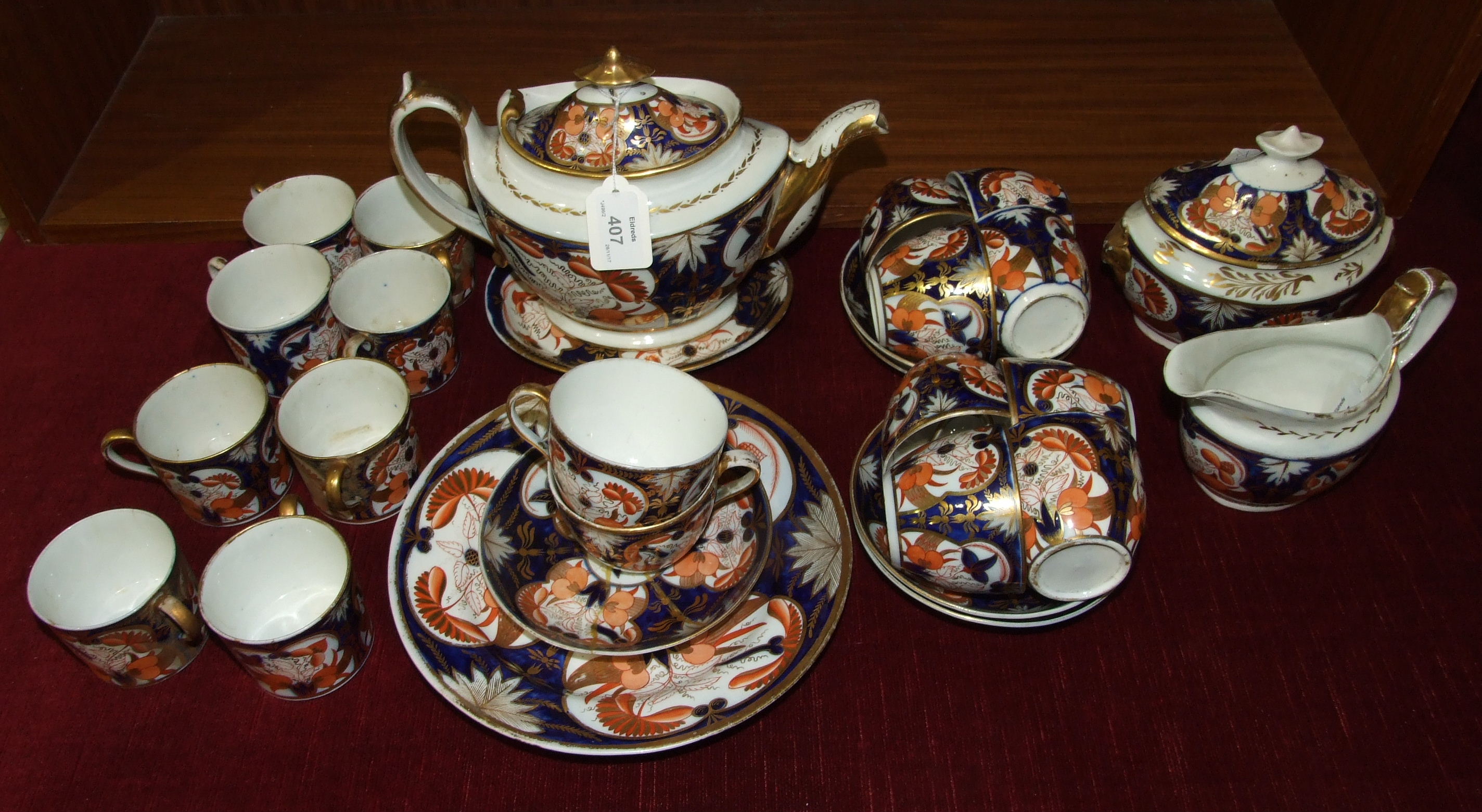 An early-19th century English porcelain Imari pattern part tea service, thirty pieces.