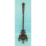 A 20th century Chinese carved hardwood lamp standard, the column carved with dragons to a square