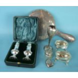 A pair of octagonal shaped silver peppers in fitted case, Chester 1916, 9cm high, a pair of salts