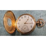 A 9ct gold cased half hunter keyless pocket watch, the white enamel dial with Arabic numerals and