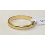 An 18ct yellow gold wedding band, size P, 2.8g.