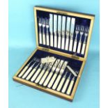 A set of twelve each plated, ivory-handled dessert knives and forks by George Butler & Co,