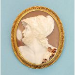A Victorian shell cameo brooch depicting a bust of Mars, indistinctly signed on the back and mounted