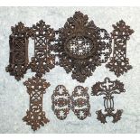 Seven Berlin iron work bracelet panels, including a clasp stamped Geiss, A. Berlin and one other