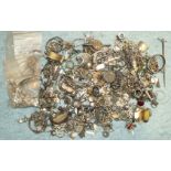 A quantity of mainly silver and white metal jewellery fragments, etc.