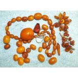 A quantity of butterscotch amber graduated beads, loose and strung, largest 3 x 2.6cm, then 2 x 1.