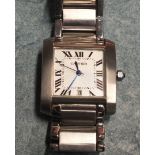 Cartier, a gents Tank Française wrist watch, the silvered dial with Roman numerals and date