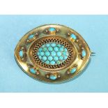 A Victorian gold brooch set a turquoise cluster in marquise mount with cannetile decoration and