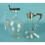 A silver mounted plain glass claret jug of rounded shape with star cut base, London 1899, 23cm