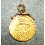 A 1788 guinea soldered as a pendant, 9.3g.