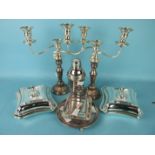A pair of silver plated two branch candelabra, 33cm high, a pair of silver plated shaped rectangular