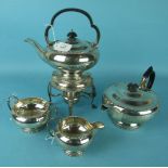 A silver four-piece tea service, comprising: teapot, spirit kettle, cream jug and sugar bowl, of