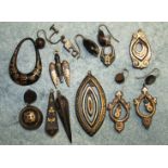 A pair of Victorian tortoiseshell pique earrings (one af), and eleven single earring parts.