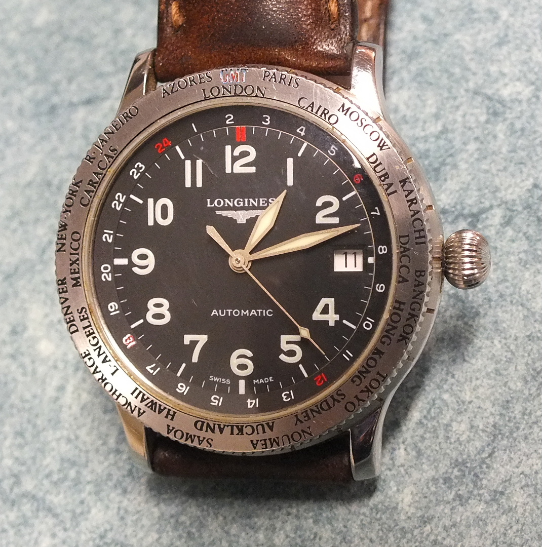 Longines, a Swissair Exclusive no.4 "World Timer Avigation" automatic wrist watch, the black dial